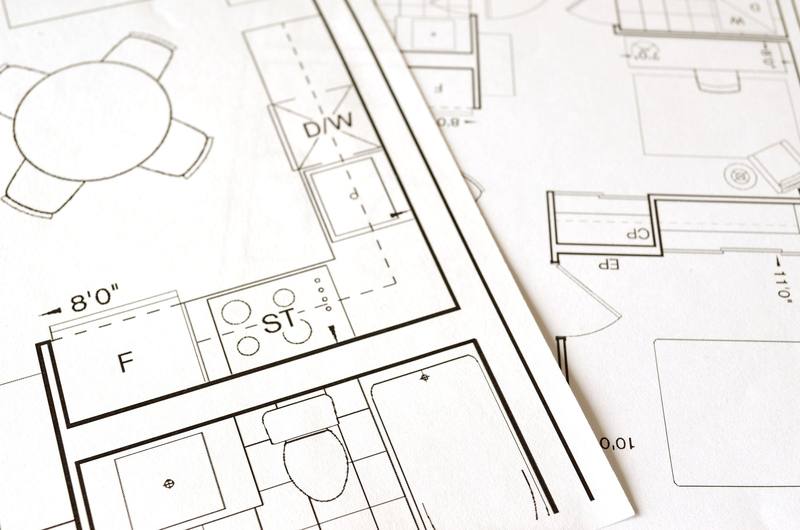 Printed house floor plan with room layouts